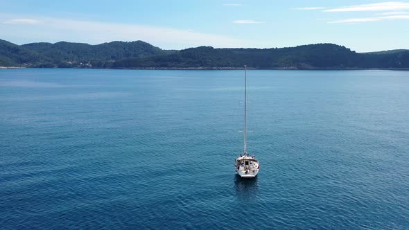 Aerial View of a Sailboat in Adriatic Sea Near Croatia at Summer Day