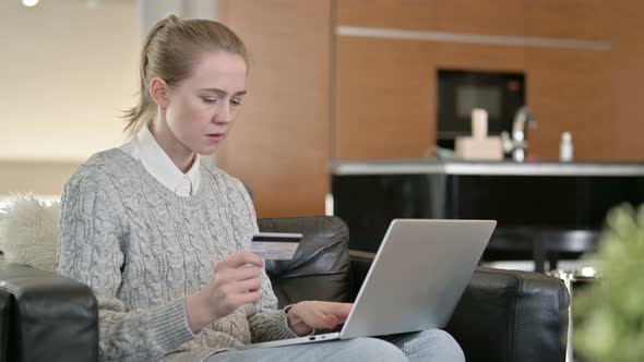 Unsuccessful Online Payment By Young Woman on Laptop 