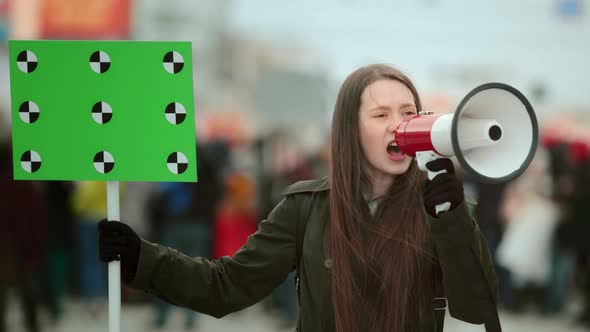 Activist Girl Feminist Shout Megaphone City Street. Crowd of Feminism Scream