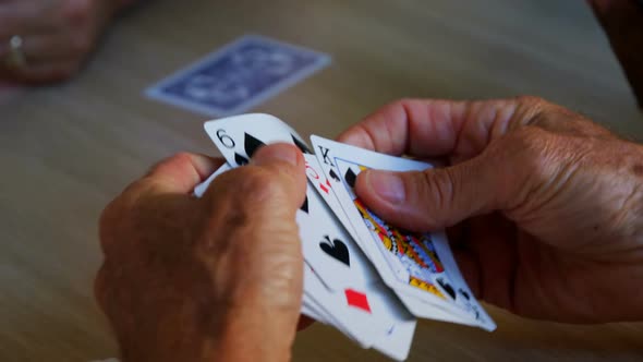 Seniors playing cards in retirement home 4k
