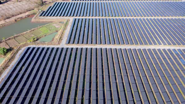 Eco Power Concept Save Earth. Green tech.Aerial Solar power plant. Renewable energy
