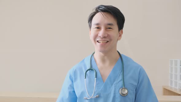 portrait of smart asian doctor explain and suggesting a way to takecare yourself