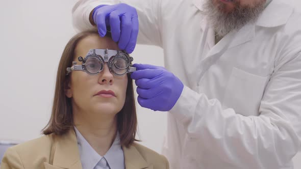 Female Patient in Trial Frame Having Eye Vision Test