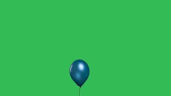 Blue Balloon on a Ribbon Flies Up and Flies Away Against the Background of a Green Screen Chroma Key