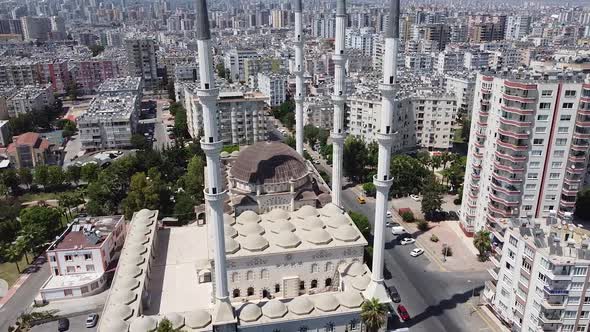 Aerial view of mosque and panorama of city. Mugdat Mosque, Mersin, Turkey