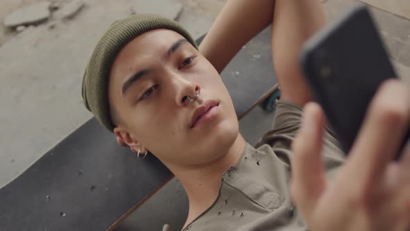 Fashionable young man in an abandoned warehouse