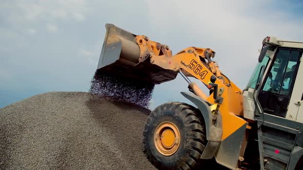 Heavy excavator on quarry. Heavy duty machinery working on quarry