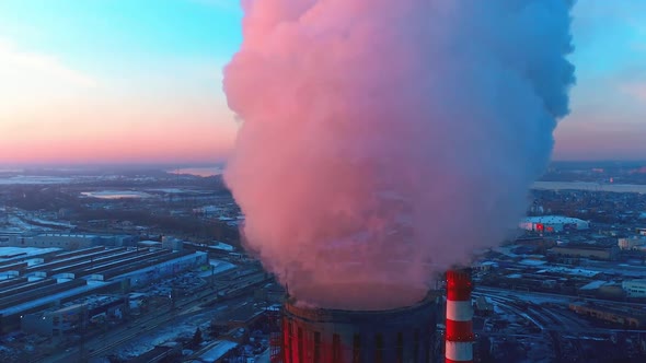 Smoke From the Industrial Pipes at City Background