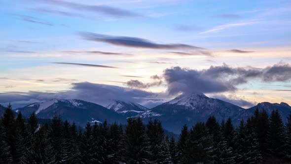 Clouds Forming Over the Mountains at Dusk