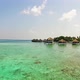 Aerial View of Luxurious Overwater Bungalows at Villas Resort in Maldives Islands 01 - VideoHive Item for Sale