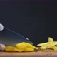 Experienced Cook Holds Steel Knife and Cuts Yellow Pepper - VideoHive Item for Sale