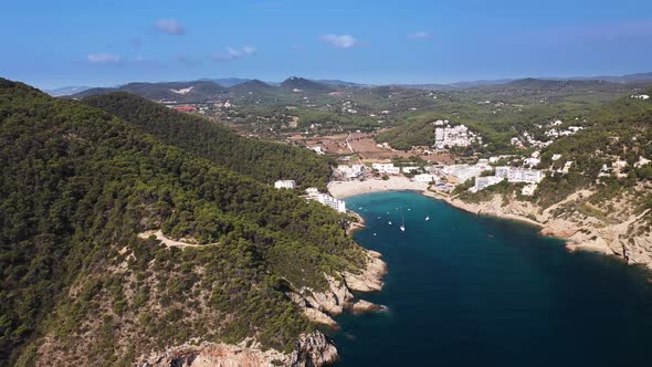 Aerial footage of the Spanish island of Ibiza showing the beautiful beach front