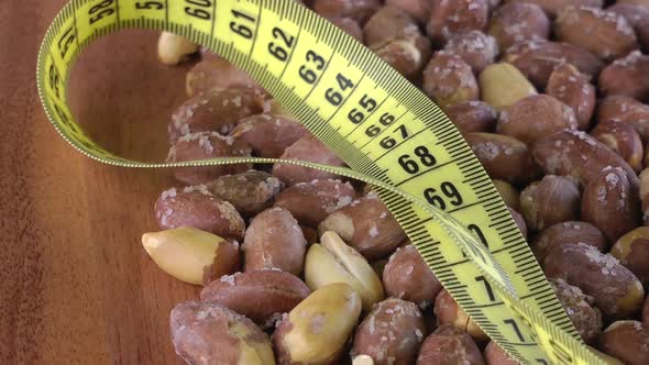Roasted Peanut With Tape Measurement Turning 20