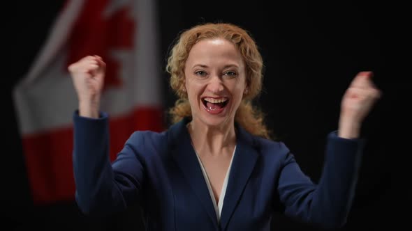 Excited Elegant Politician Woman Rejoicing Win at Black Background