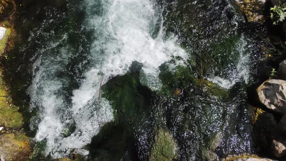 View of River Waterfall with Clear Turquoise Water