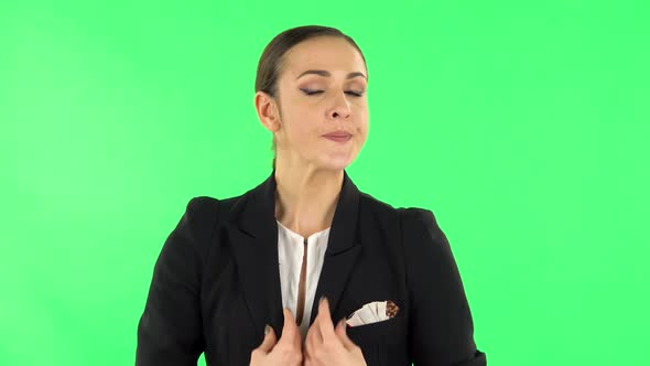 Young Tired Woman Cooling Herself By Her Hand, Suffering From High Temperature Weather. Green Screen