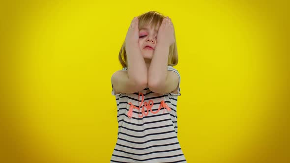 Tired Sad Upset Child Kid Girl Leaning on Hand Looking at Camera with Bored Indifferent Expression