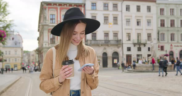 The Girl is Texting on the Phone