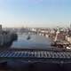 Reverse aerial view of Blackfriars train station over river Thames on a hazy sunny day - VideoHive Item for Sale