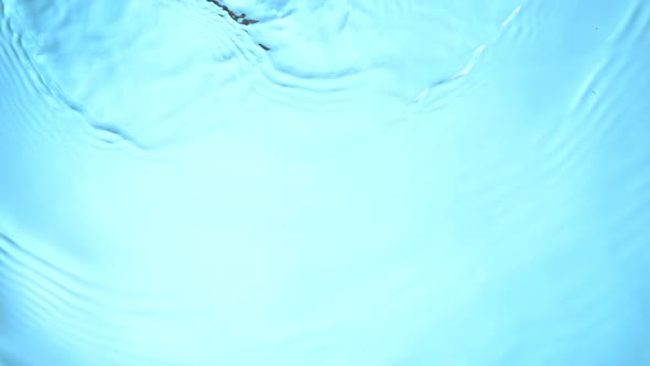 Super Slow Motion Shot of Waving Blue Clear Water Surface at 1000Fps