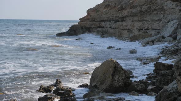 Waves Break on the Shore. Waves Break on the Rocks