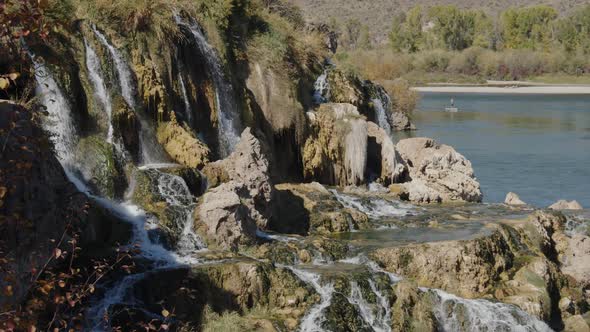 Panning view of Fall Creek Falls in Idaho along the Snake River