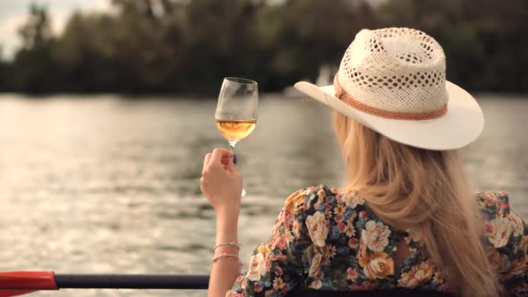 Woman Drinking White Wine Outdoor. Pretty Lady Relaxing After Hard Working Day.
