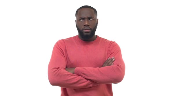 Slow Motion Confused African American Bearded Guy Cross Arms Frowning Looking Around Serious