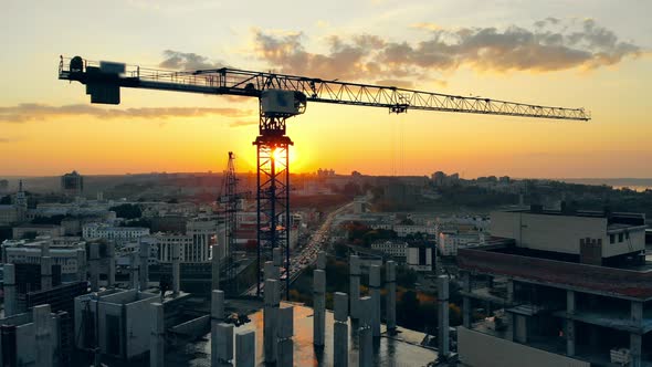 Construction Machines and Multistory Buildings in Progress alt