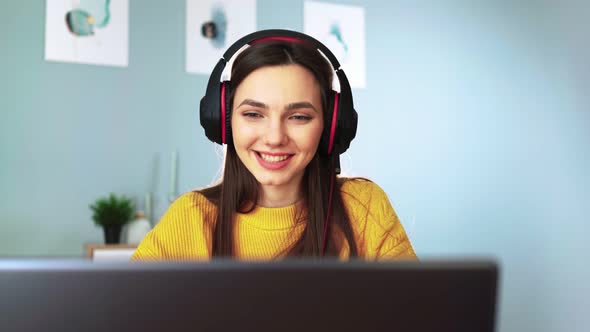 Girl Student Talking Online Via Webcam Using Video Call with Teacher