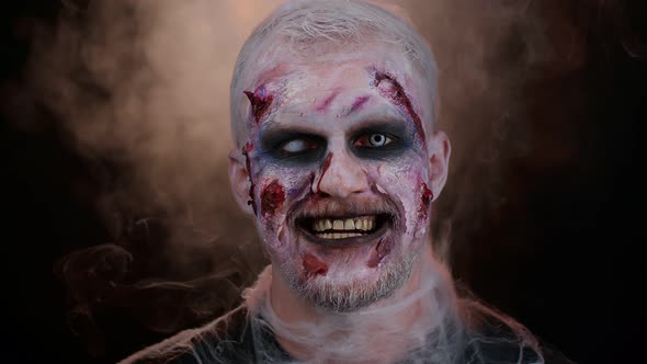 Unexpected Appearance of Sinister Man with Horrible Scary Halloween Zombie Makeup Trying to Scare