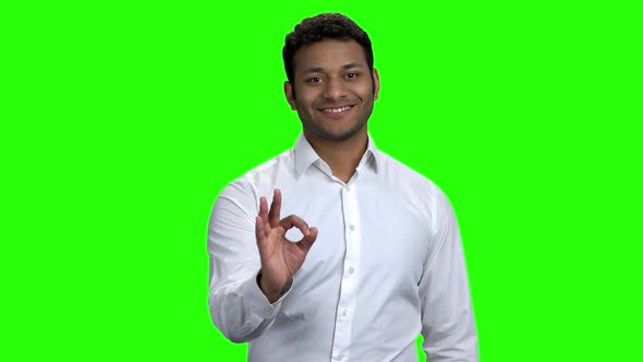 Cheerful Indian Businessman Showing OK Sign