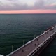 Cinematic pier in the sunset from a bird's eye view. Filming at sunset in Sopot. - VideoHive Item for Sale