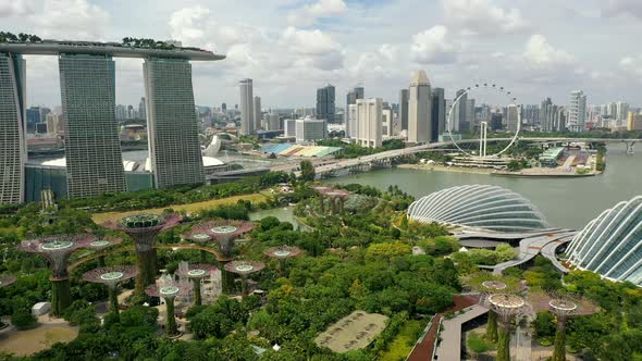 Gardens By The Bay, Flying Towards Skyline Singapore. Marina Bay In Singapore.