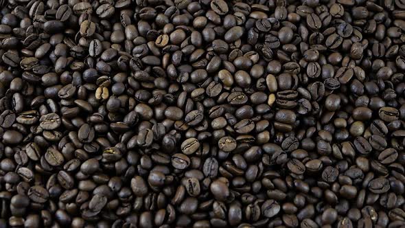 Fragrant Coffee Beans Are Fried In A Pan,Sprinkled With Coffee Beans,Close Up