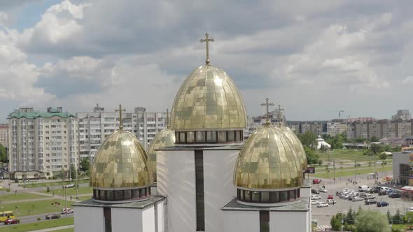 Dome of the Church Aerial View Traditional Old Church in Lviv Ukraine City Cloudy Blue Sky