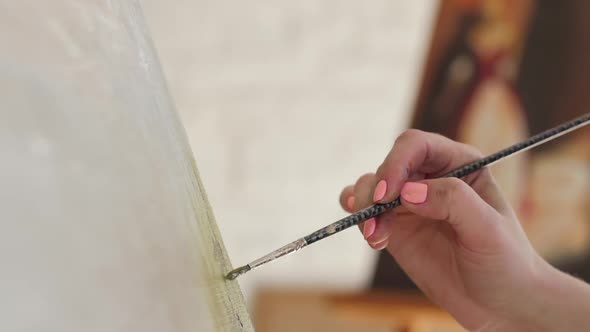 Artist Brush Does Strokes Oil Paint on Canvas, Slow Motion