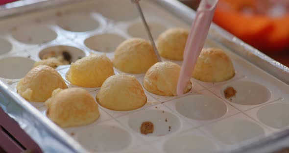 Cooking takoyaki at home