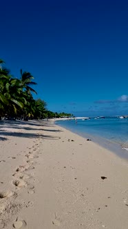 Le Morne MauritiusTropical Beach with Palm Trees and White Sand Blue Ocean and Beach Beds with