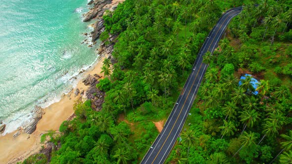 Drones fly over the shores of tropical seas. Beach summer scene