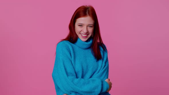 Cheerful Lovely Teenager Student Girl Fashion Model in Blue Sweater Smiling and Looking at Camera