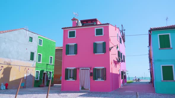 Manless Streets of Burano with Neat Pink House at Sunlight