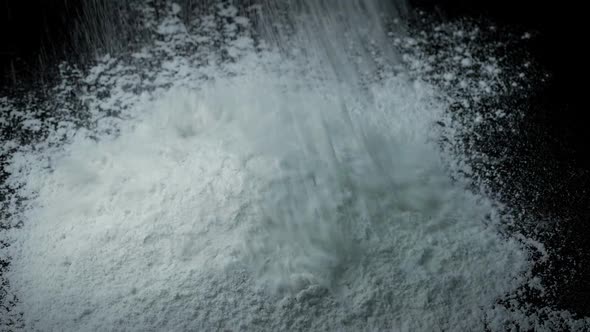 White Powder Is Poured Into Pile