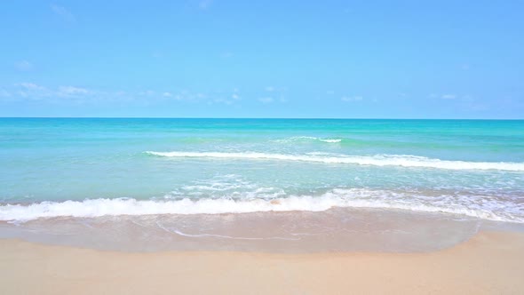 Beautiful tropical beach sea ocean with blue sky and white cloud