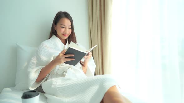 Young asian woman read book