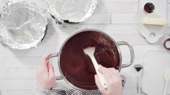 Flat lay. Step by step. Mixing ingredients in the cooking pot to make simple chocolate fudge