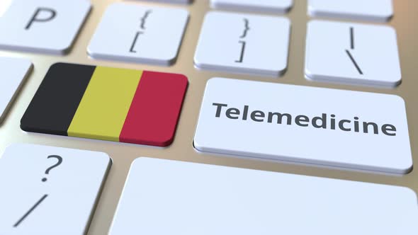 Telemedicine Text and Flag of Belgium on the Keyboard