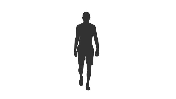 Silhouette of Shirtless Man in Shorts Walking Barefoot