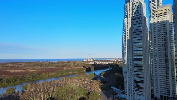 4K Aerial Drone Footage of Puerto Madero Panning Across Nature Reserve Along Coastal Waters in Argen