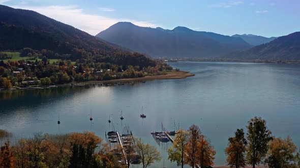 Travelling to the Tegernsee. The famous bavarian tourism hotspot in the autumn season. Zoomed out 4K